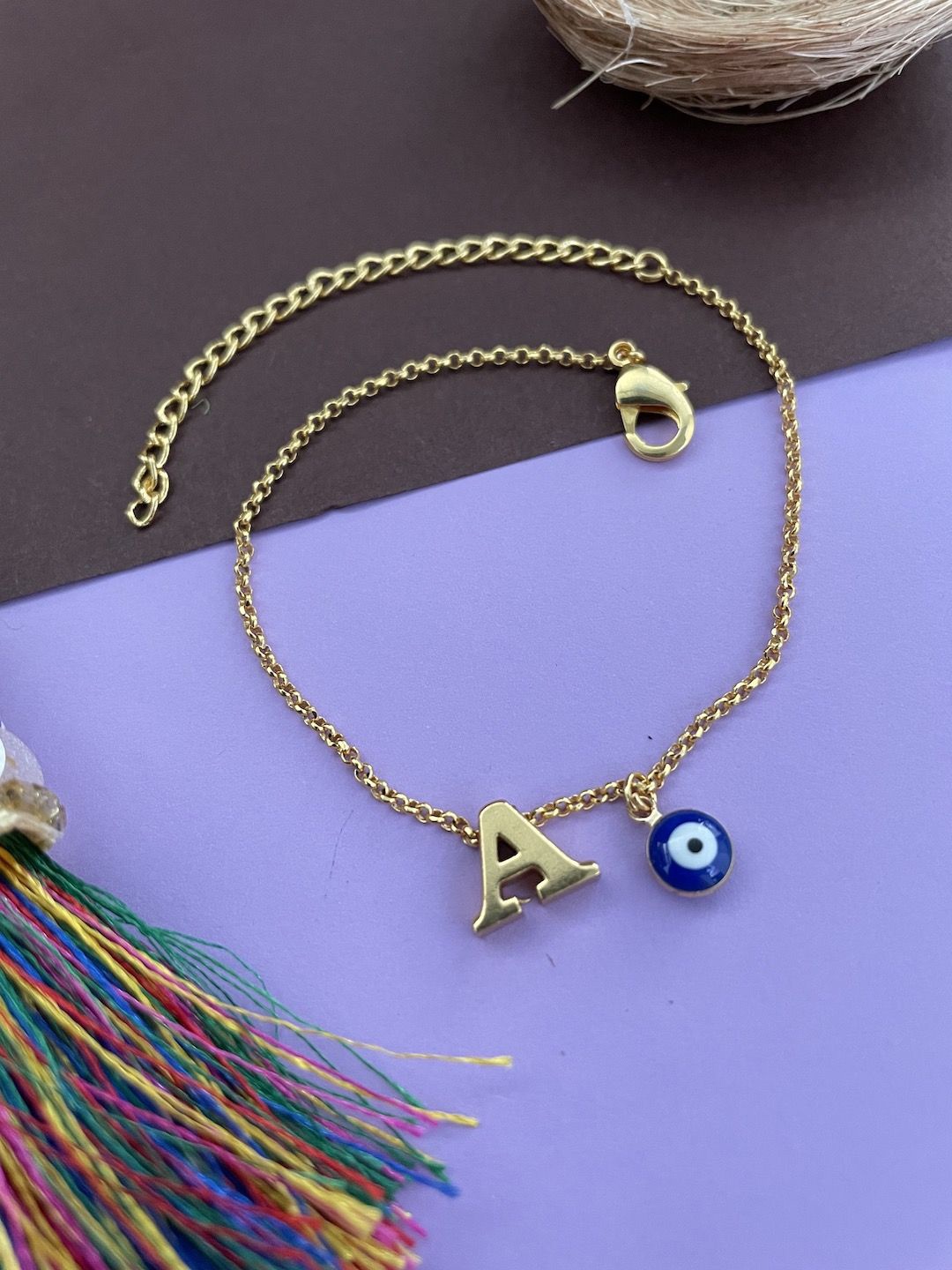 

Digital Dress Room Gold Plated Evil Eye Charm A Initial Bracelet Rakhi