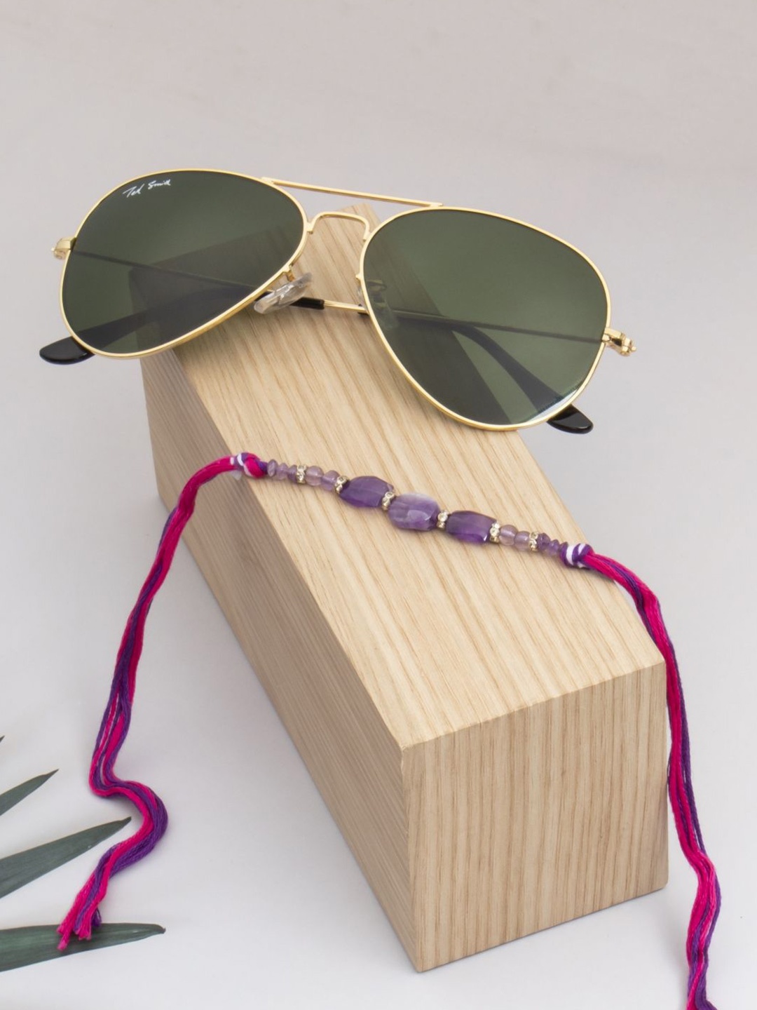 

Ted Smith Stones Studded & Beaded Rakhi With Sunglass, Gold