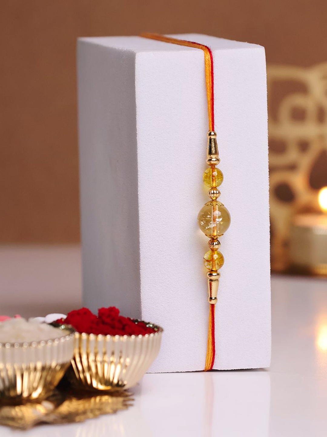 

Shubhanjali Citrine Beaded Thread Rakhi With Roli Chawal & Greeting Card, Yellow