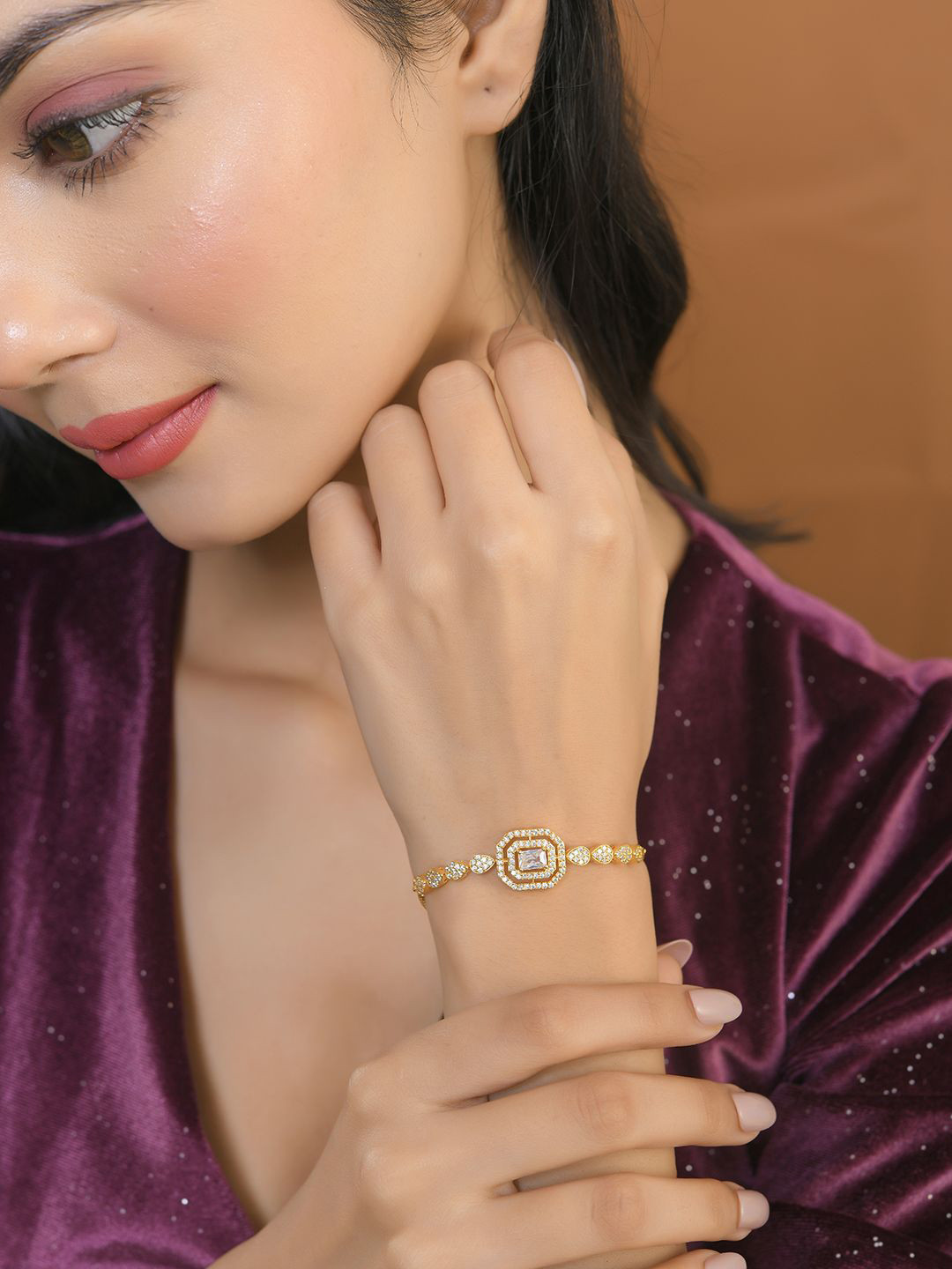 

Voylla Women Brass American Diamond Gold-Plated Cuff Bracelet