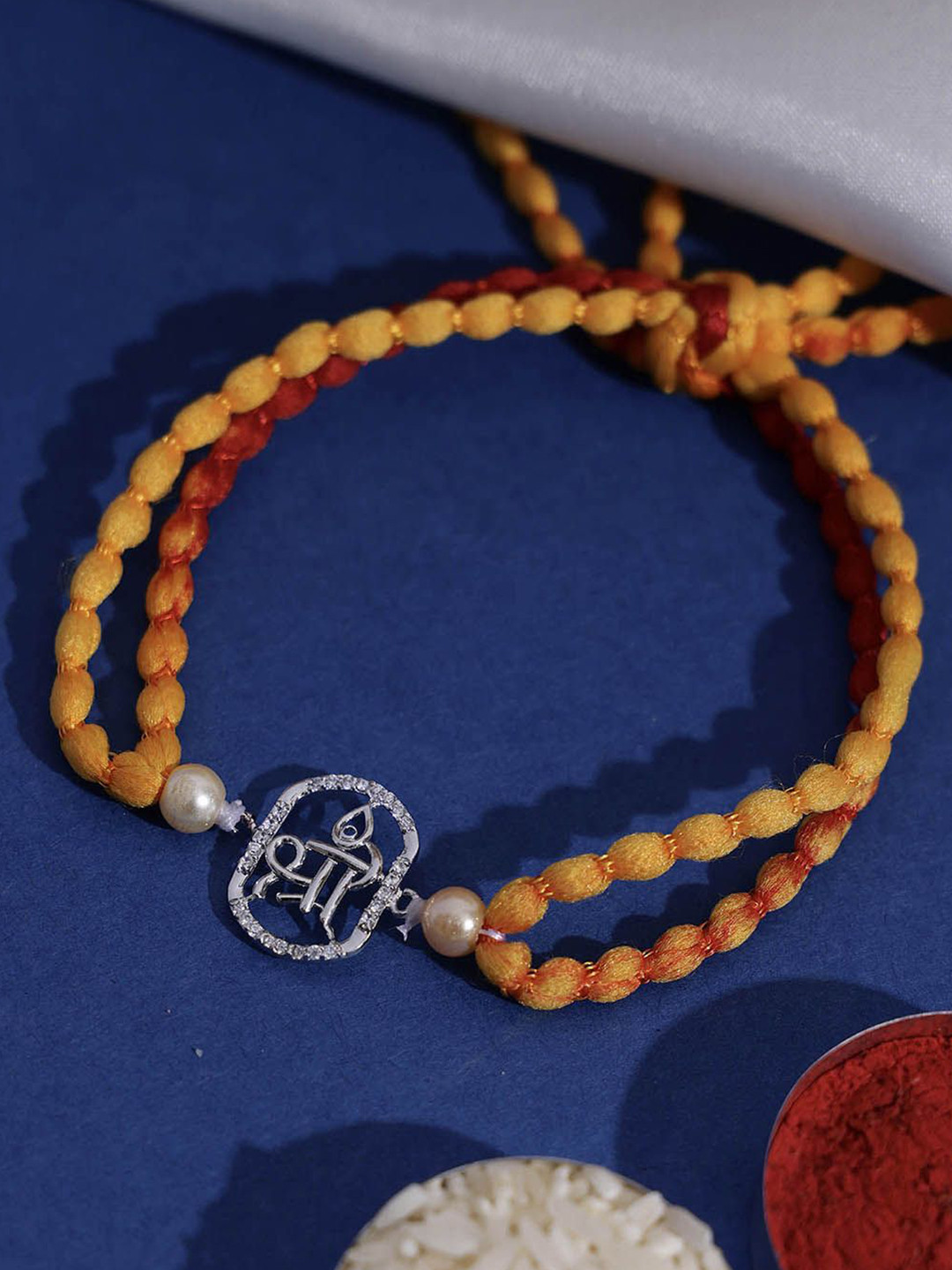 

PANASH- 925 Sterling Silver -Plated Name Of Shree CZ Stone Studded Rakhi With Roli Chawal