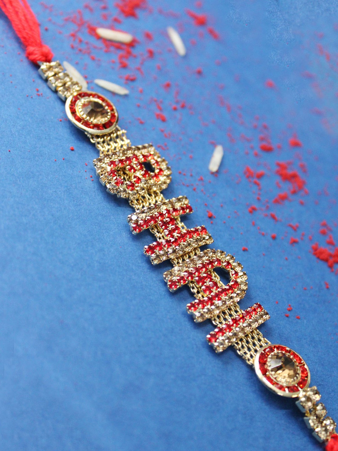 

Golden Kite Stone Studded & Beaded Thread Rakhi, Gold