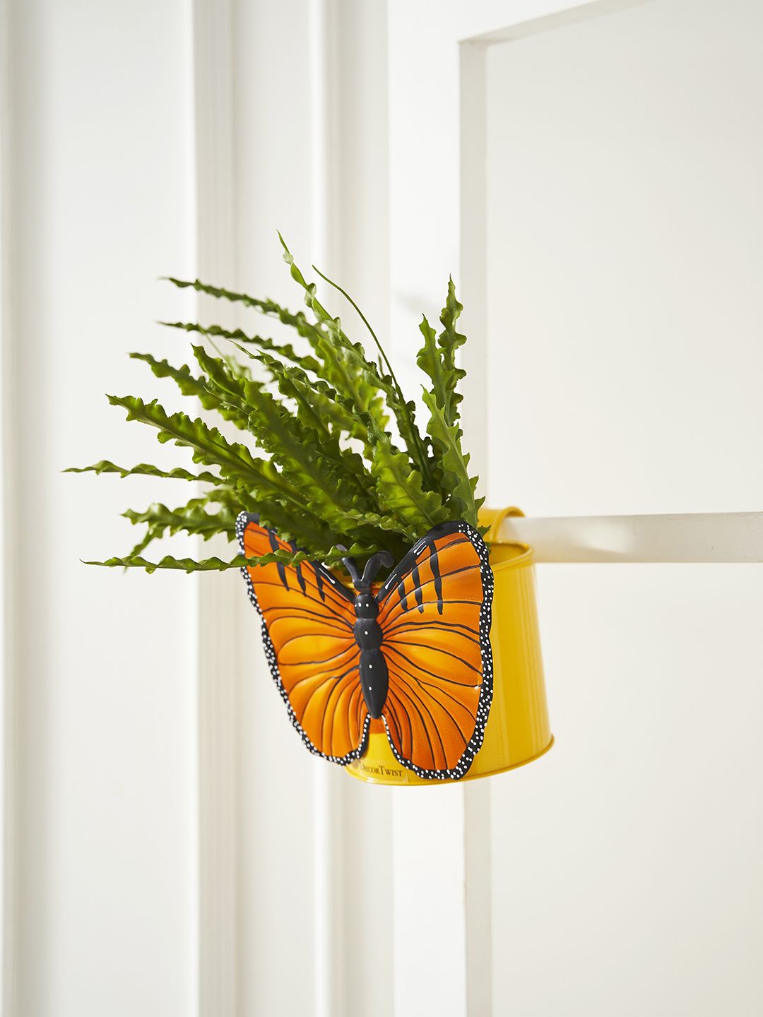 

DecorTwist Butterfly Metal Hanging Railing Planter, Yellow