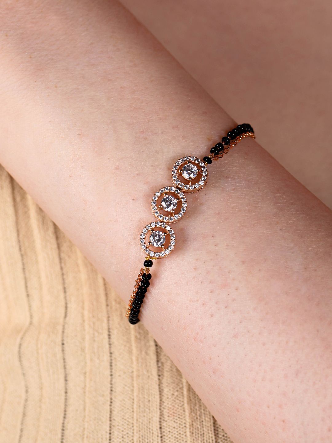 

SWASHAA Rose-Gold Plated Cubic Zirconia Studded & Beaded Mangalsutra Bracelet