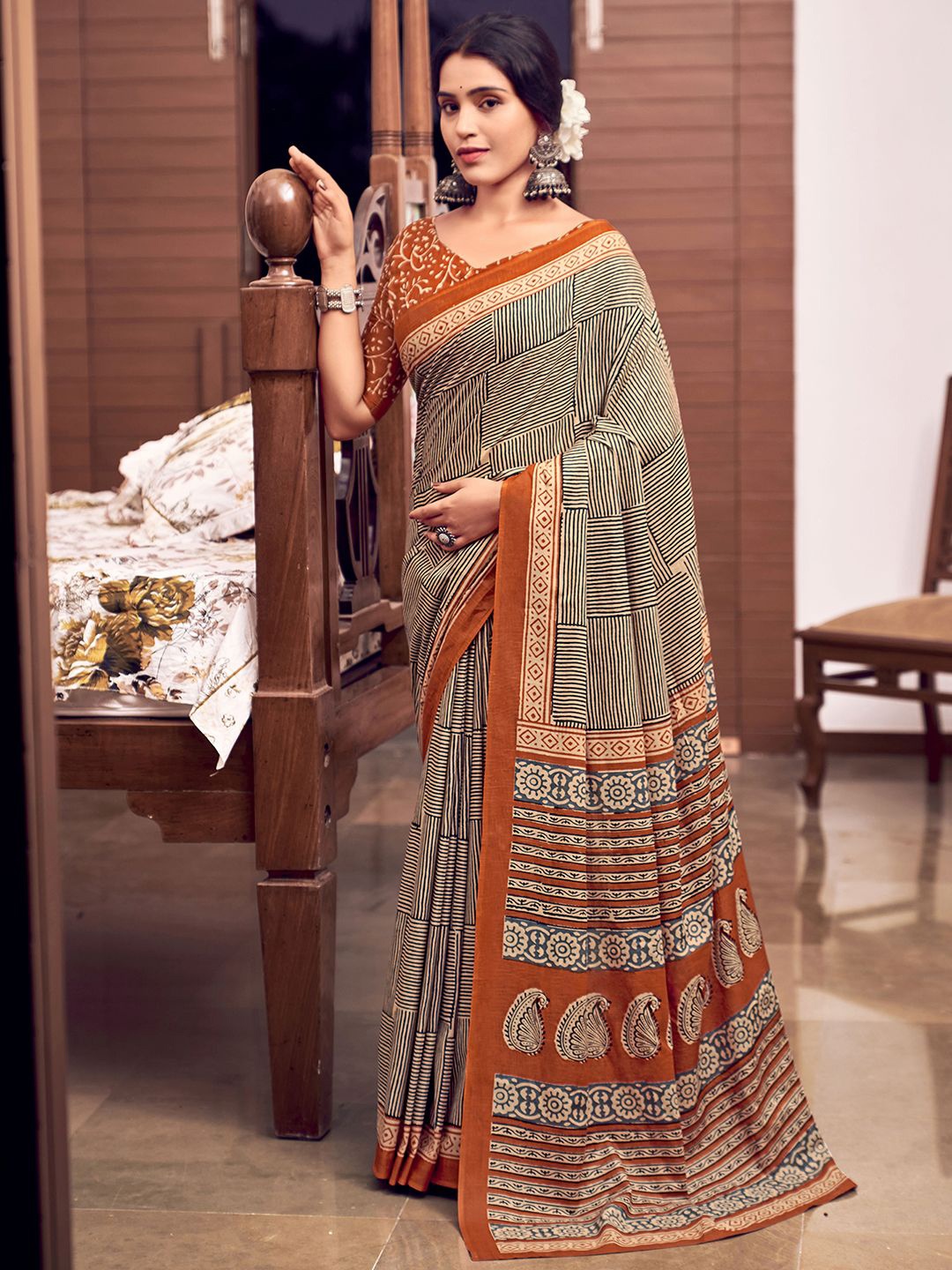 

Mitera Printed Cotton Blend Ethnic Motifs Dabu Saree, Brown