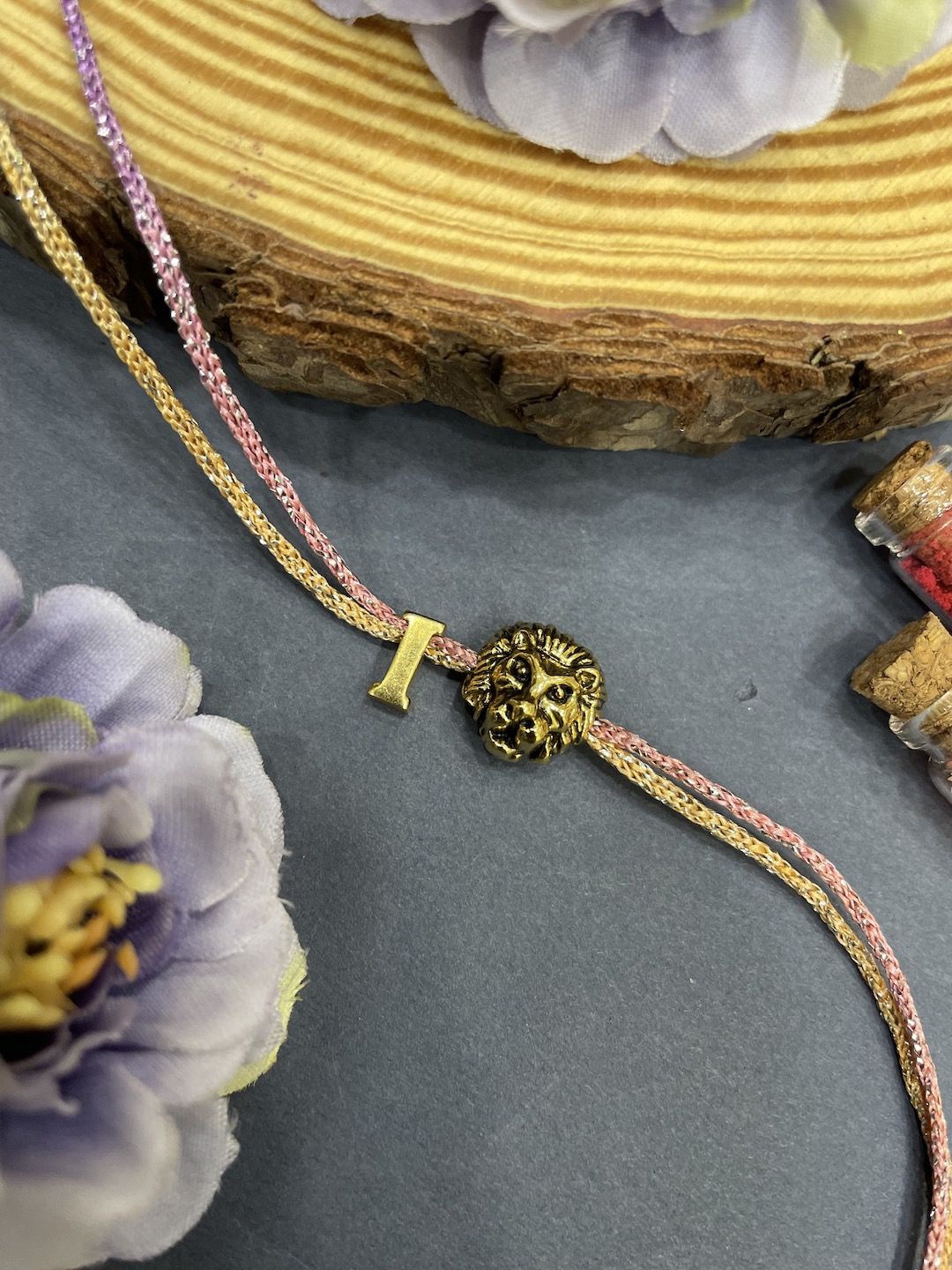 

Digital Dress Room I Initial Lion Charm Thread Rakhi, Gold