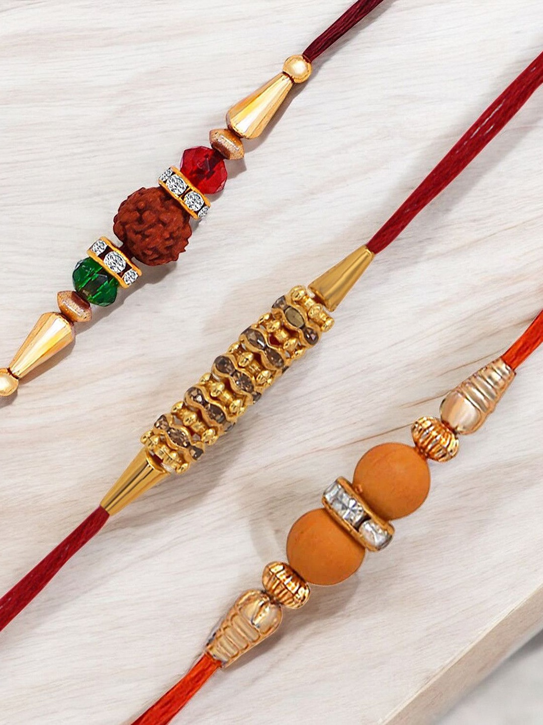 

Okos Set Of 3 Thread Rakhis, Gold