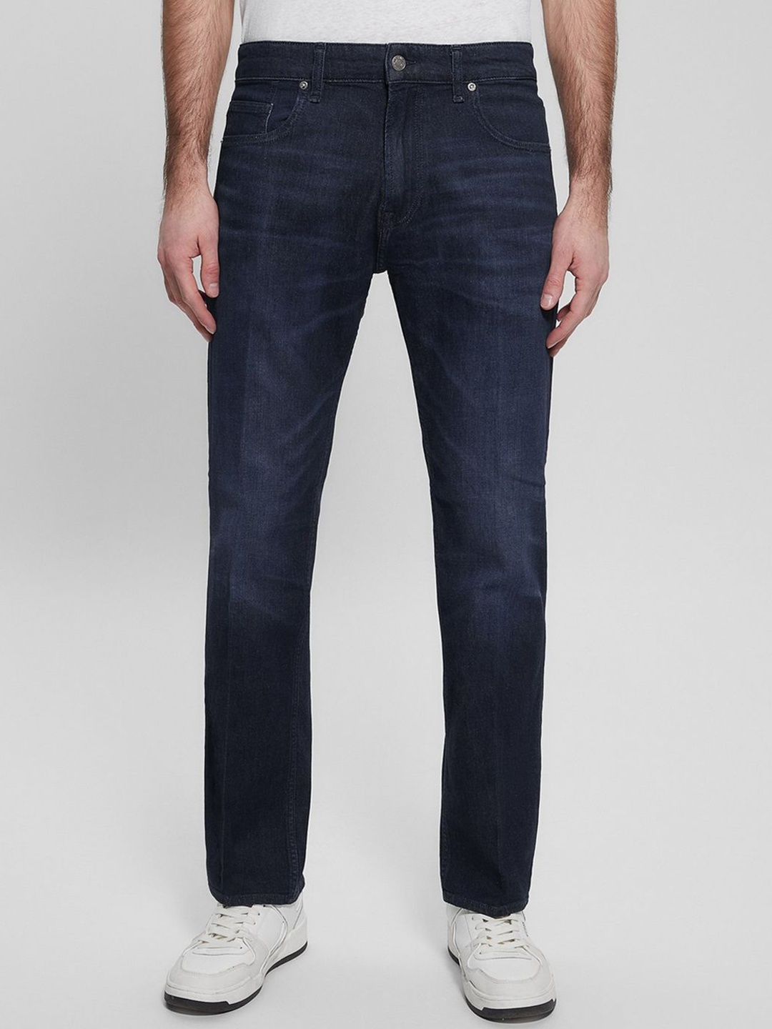 

GUESS Men Tapered Fit Solid Mid-Rise Jeans, Blue