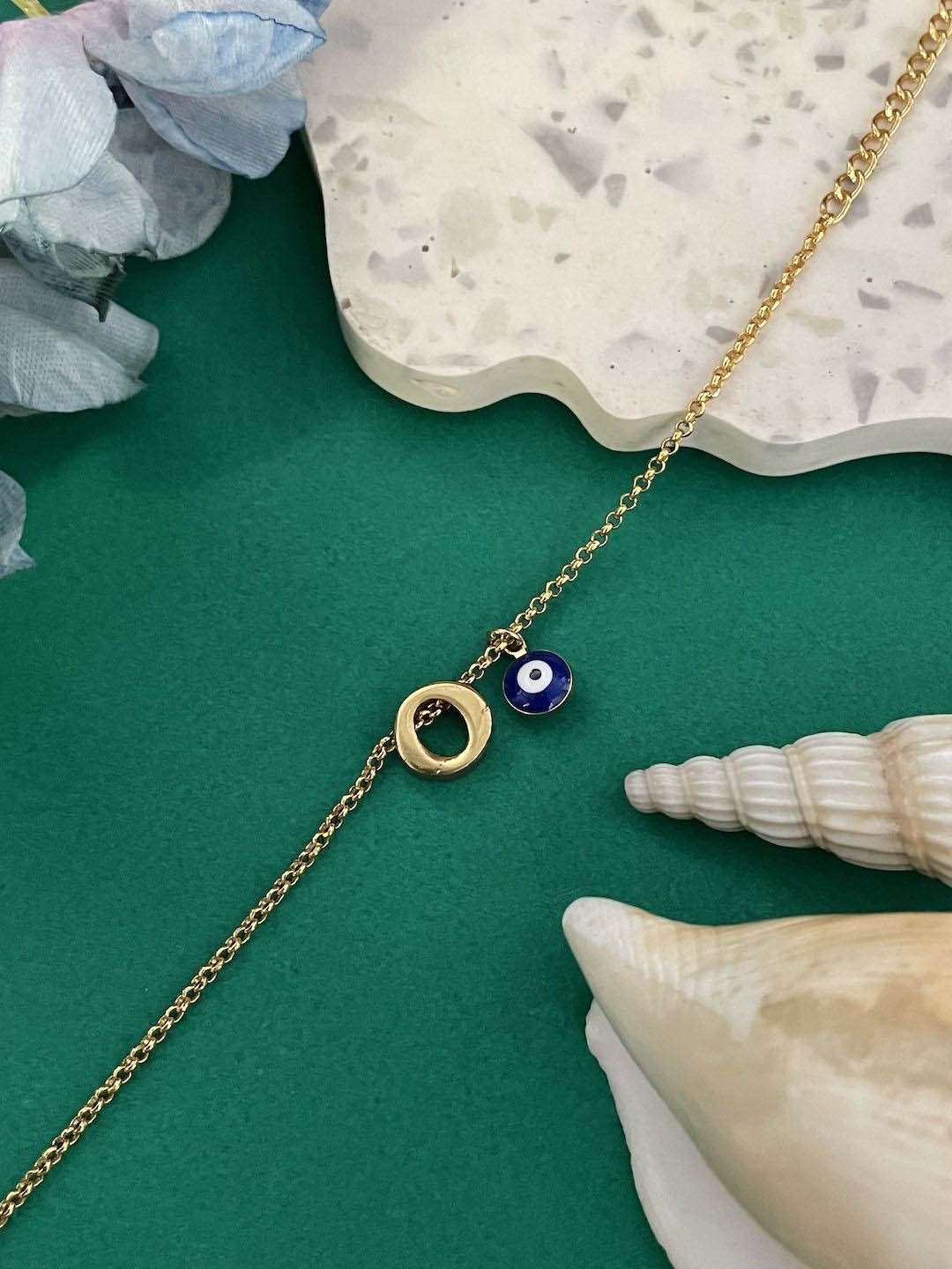 

Digital Dress Room O Initial Evil Eye Wraparound Rakhi, Gold
