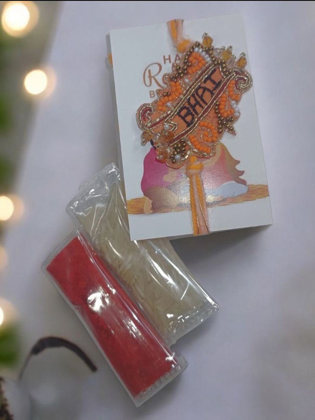 

PRIAANSHA CREATIONS Thread Rakhi, Orange