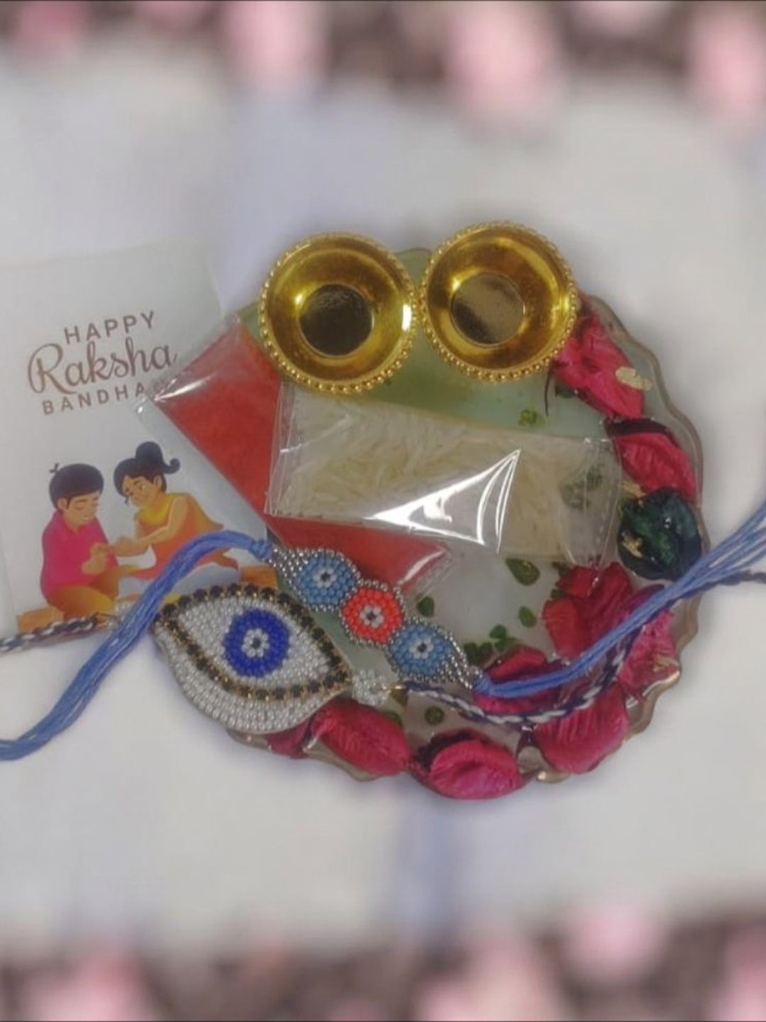 

PRIAANSHA CREATIONS Set Of 3 Beaded Rakhi With Thali Roli Chawal & Greeting Card Gift Set, Blue