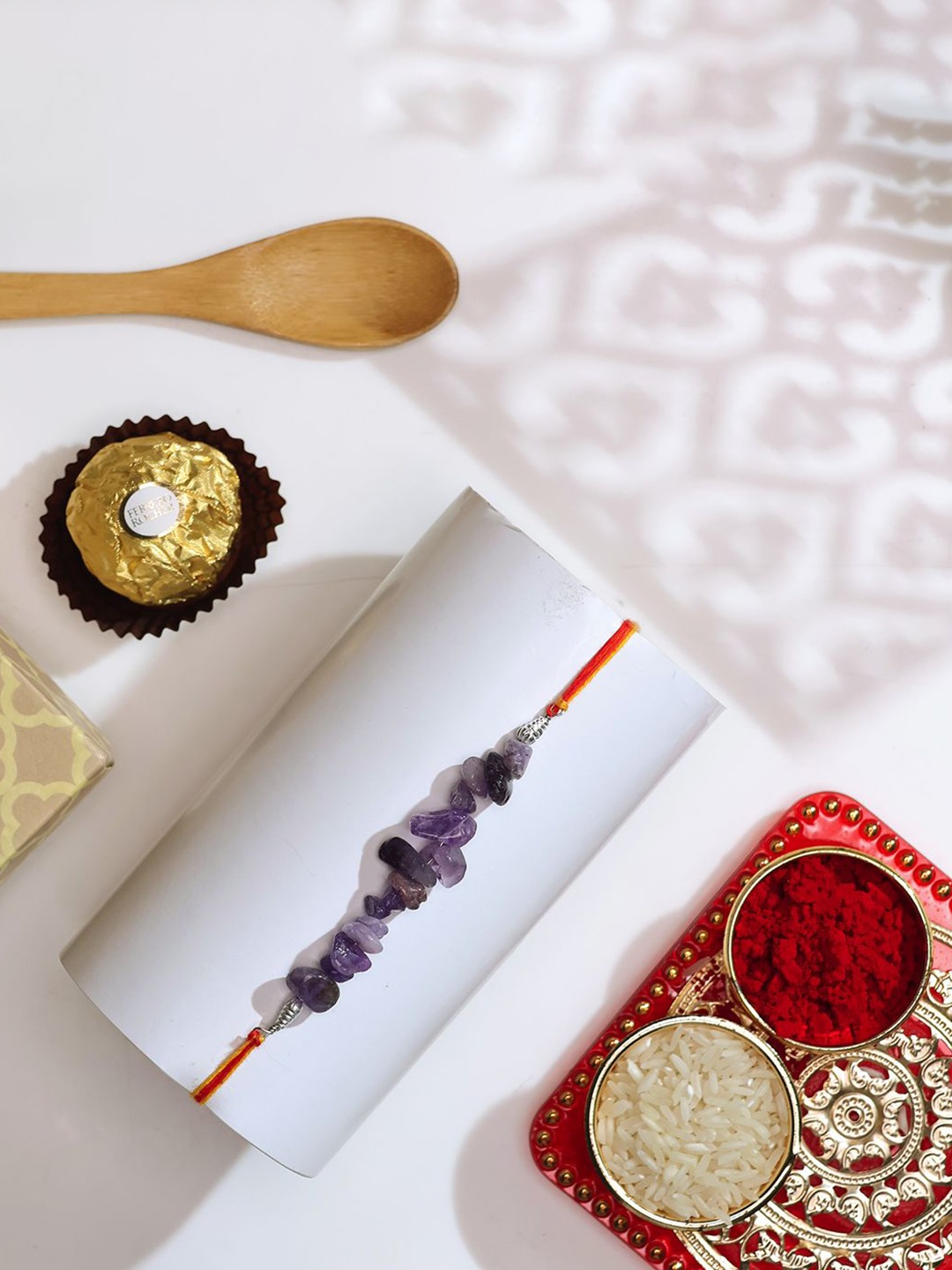 

Shubhanjali Amethyst Chips Thread Rakhi With Roli Chawal & Greeting Card, Purple