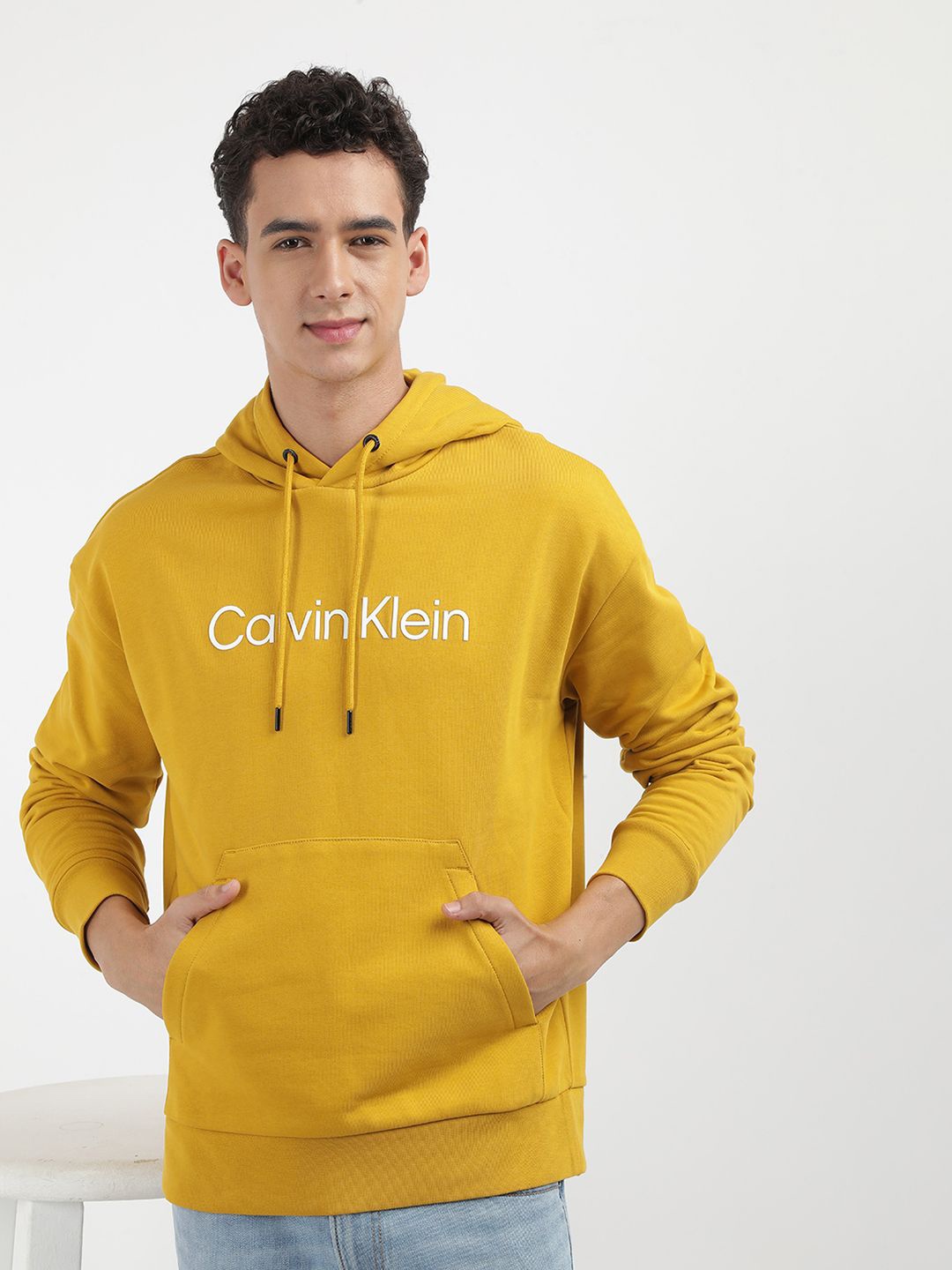 

Calvin Klein Jeans Men Typography Printed Cotton Hooded Sweatshirt, Yellow