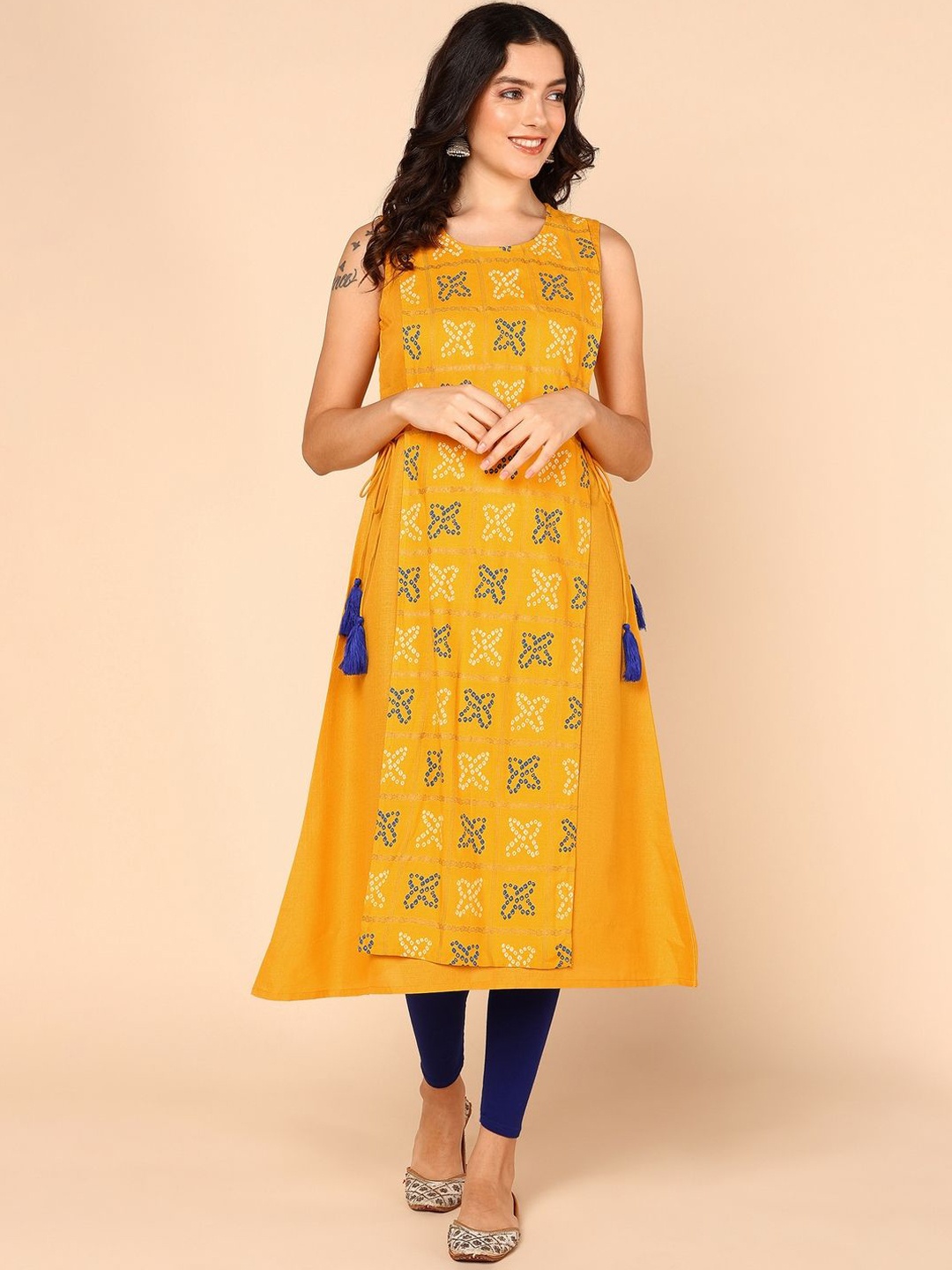 

Shiv ali apparels Ethnic Motifs Printed Sleeveless Cotton A Line Kurta, Yellow
