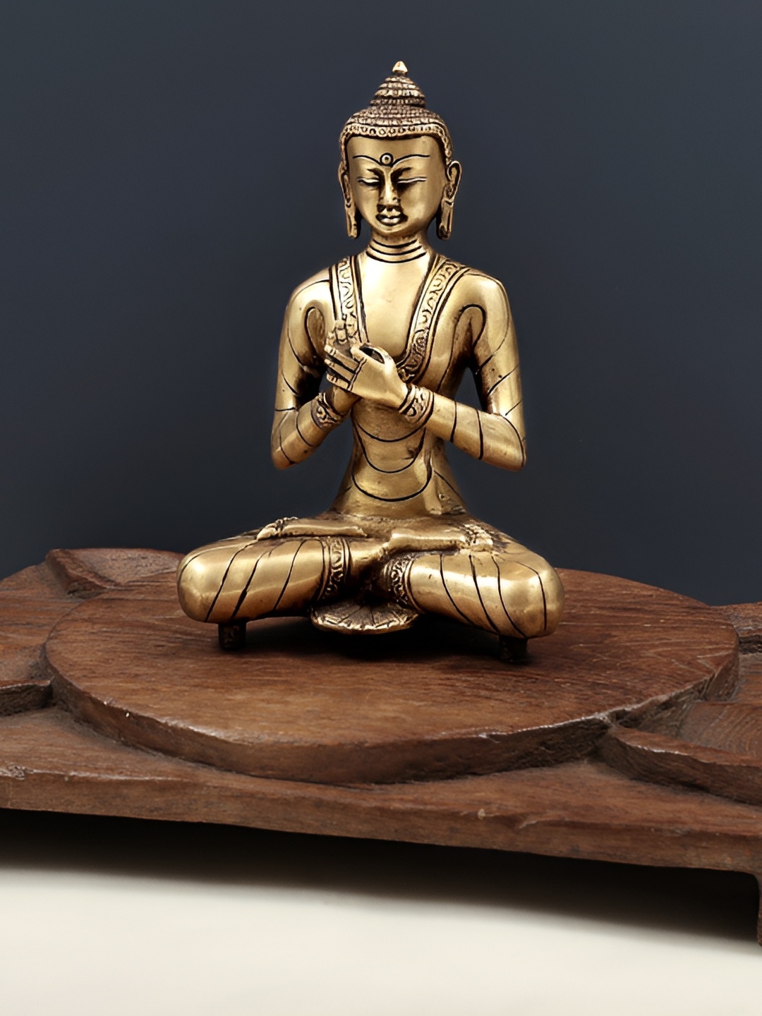 

Exotic India Gold-Toned & Brown Buddha Brass Idol Showpiece