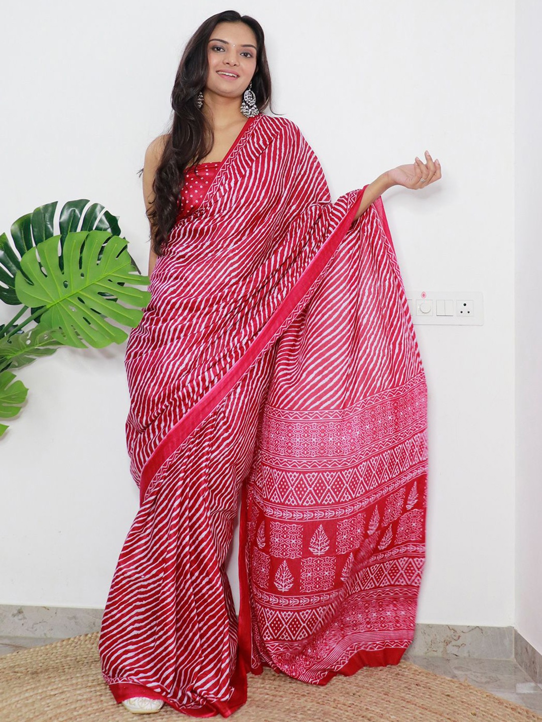 

Saree mall Leheriya Printed Sarees, Pink