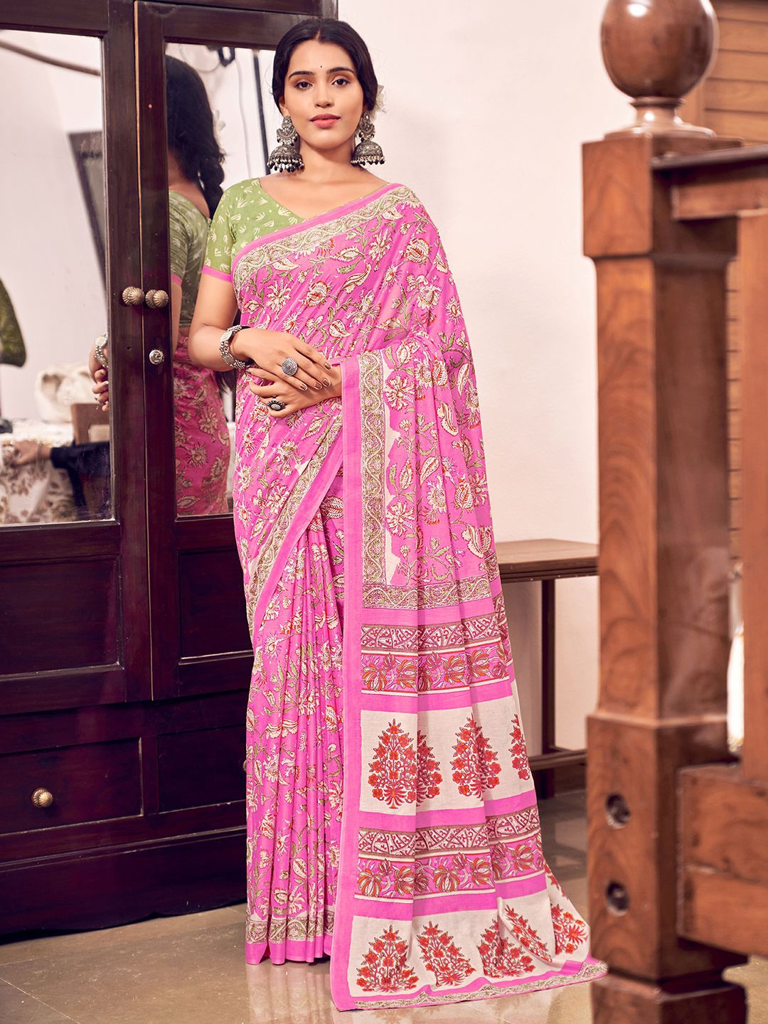 

Mitera Printed Cotton Blend Ethnic Motifs Dabu Saree, Pink