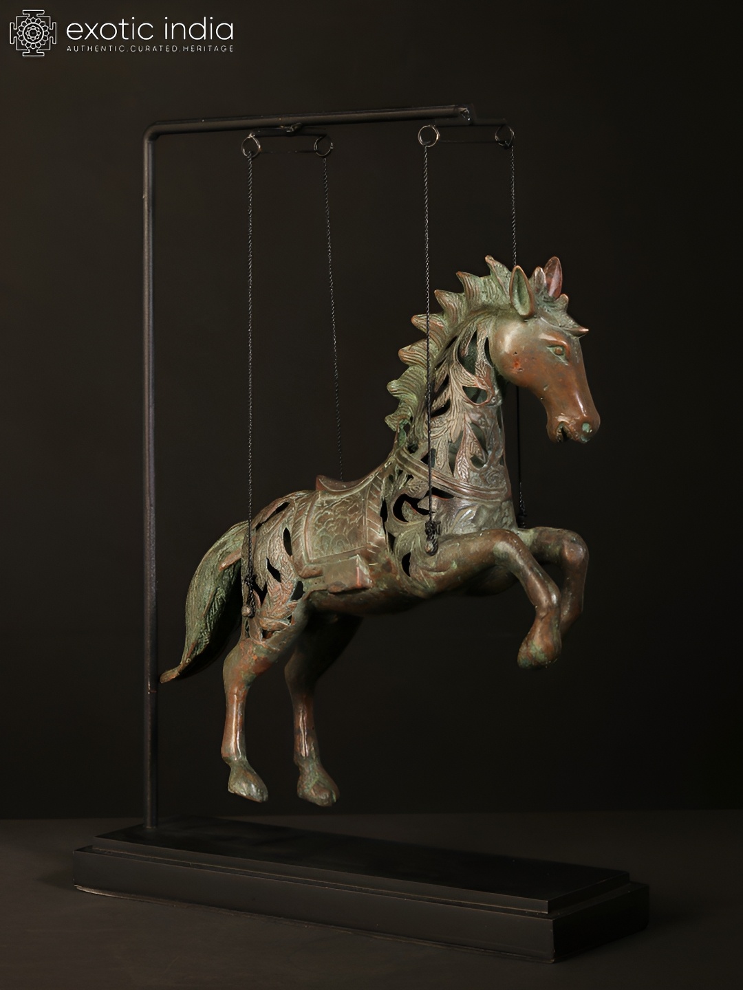 

Exotic India Gold-Toned Brass Hanging Horse on Stand Showpiece