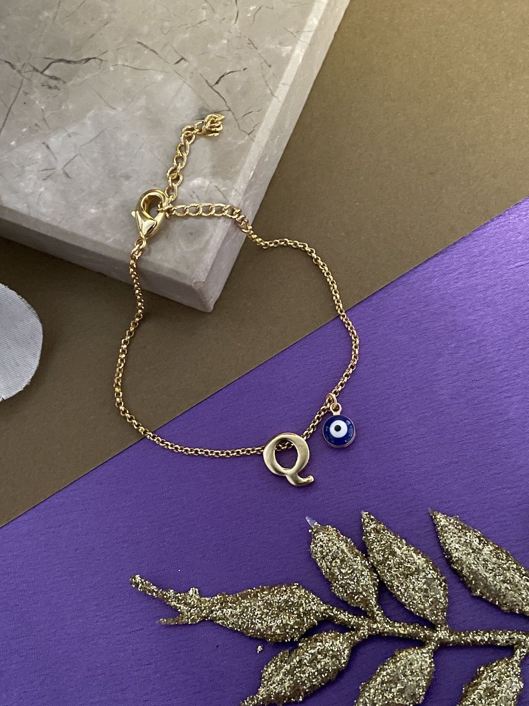 

Digital Dress Room Q Initial Evil Eye Wraparound Rakhi, Gold