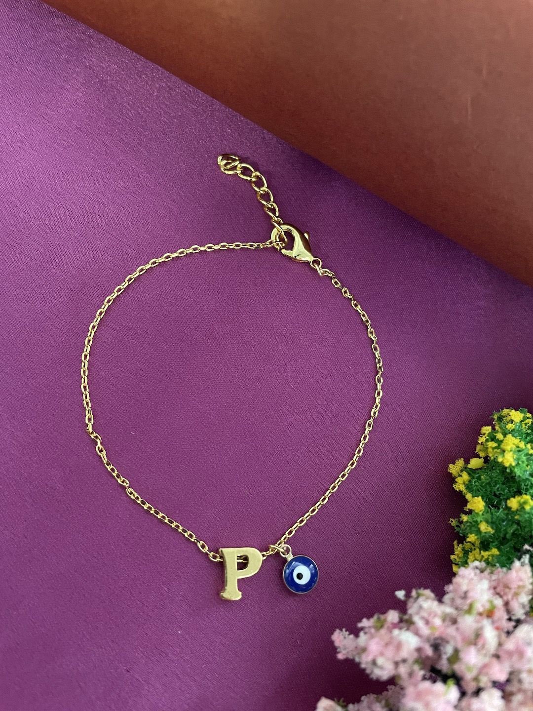 

Digital Dress Room Gold Plated Evil Eye Charm P Initial Bracelet Rakhi