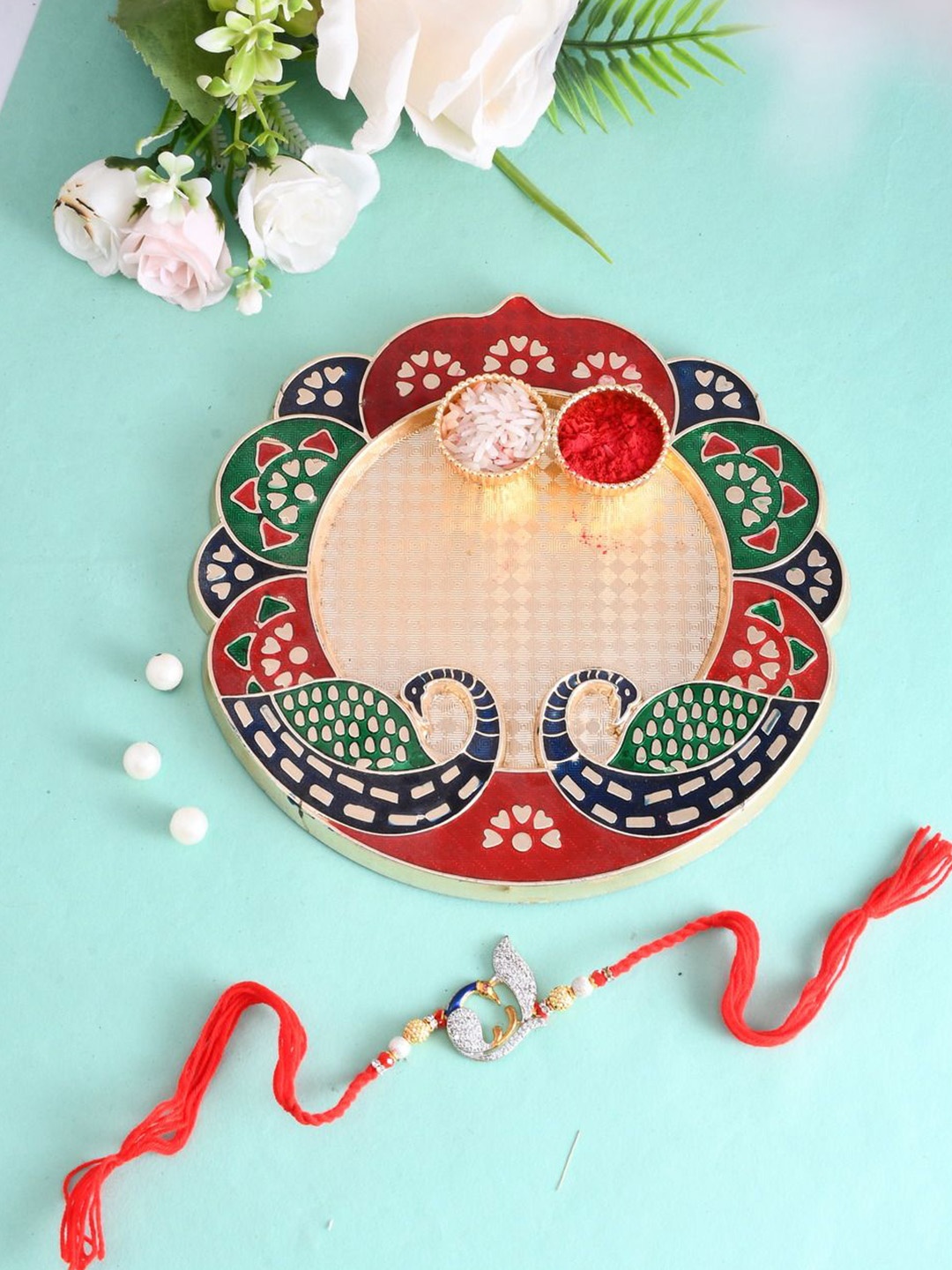 

Aapno Rajasthan Set of 2 Beaded Rakhis With Pooja Thai And Roli Chawal, Red