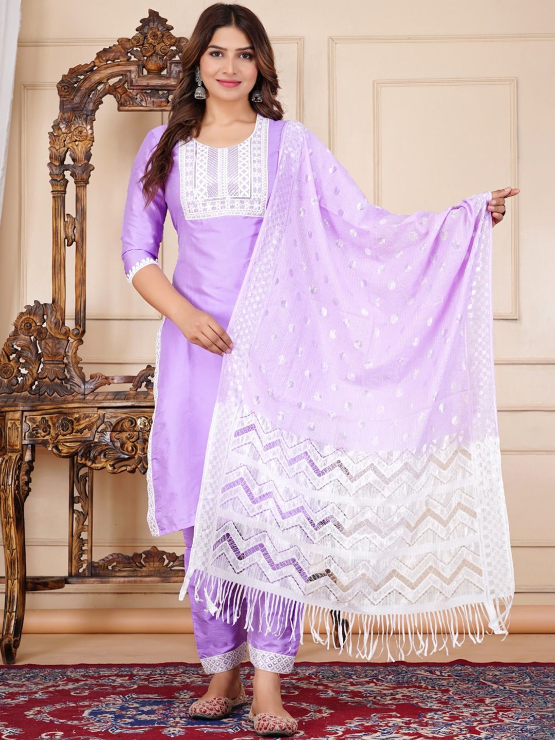 

Misti Exim Ethnic Motifs Embroidered Thread Work Kurti with Trousers & Dupatta, Purple