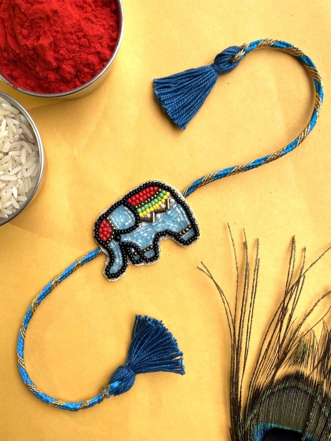 

Crunchy Fashion Thread Rakhi, Blue