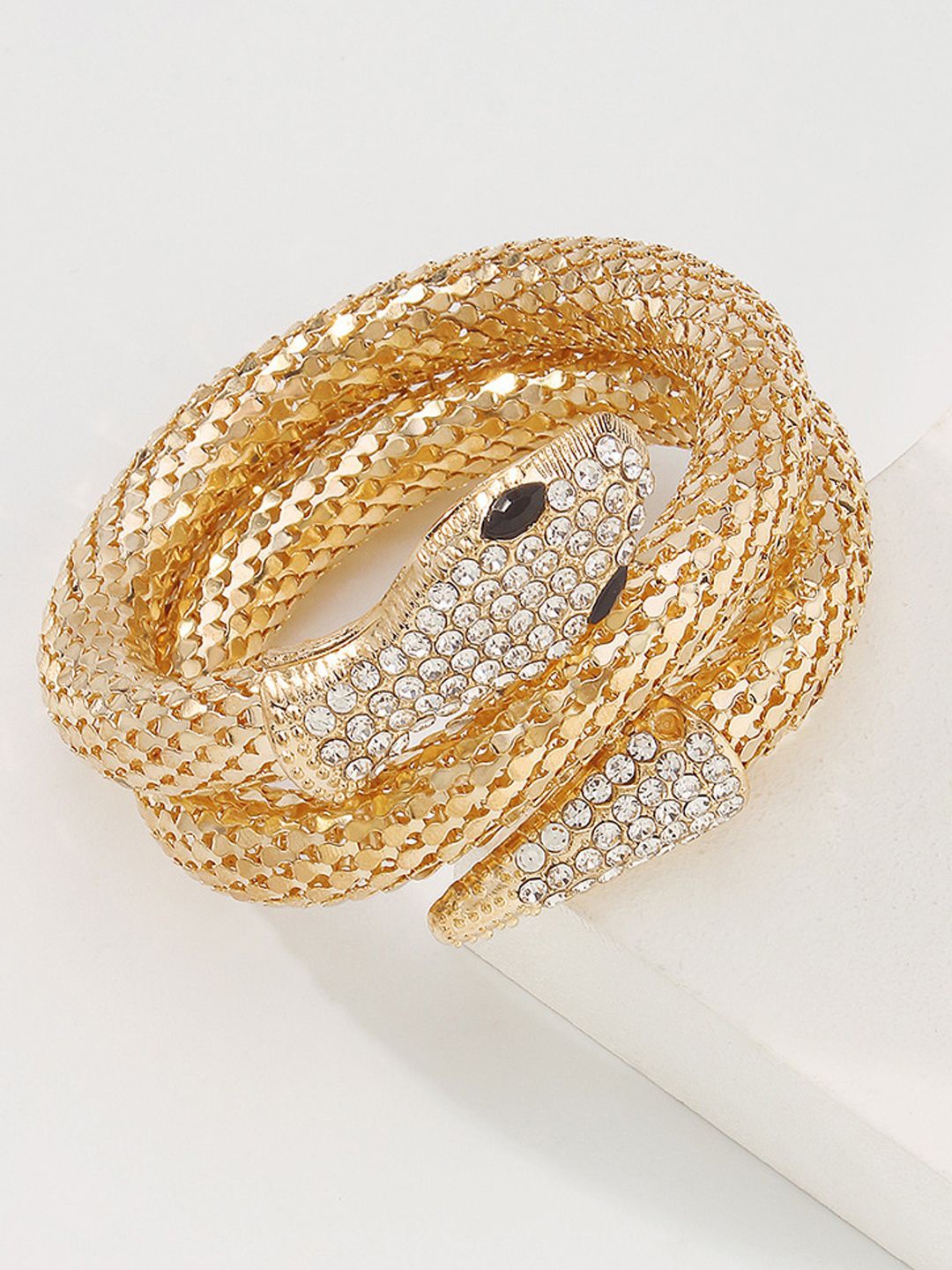 

VAGHBHATT Gold-Plated Stone-Studded Snake Shaped Cuff Bracelet