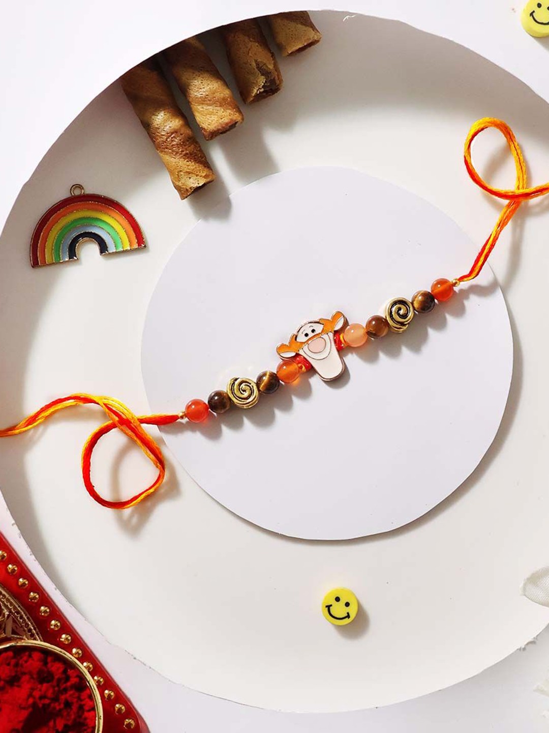

Shubhanjali Tiger Face Courage Thread Rakhi With Roli Chawal & Greeting Card, Red