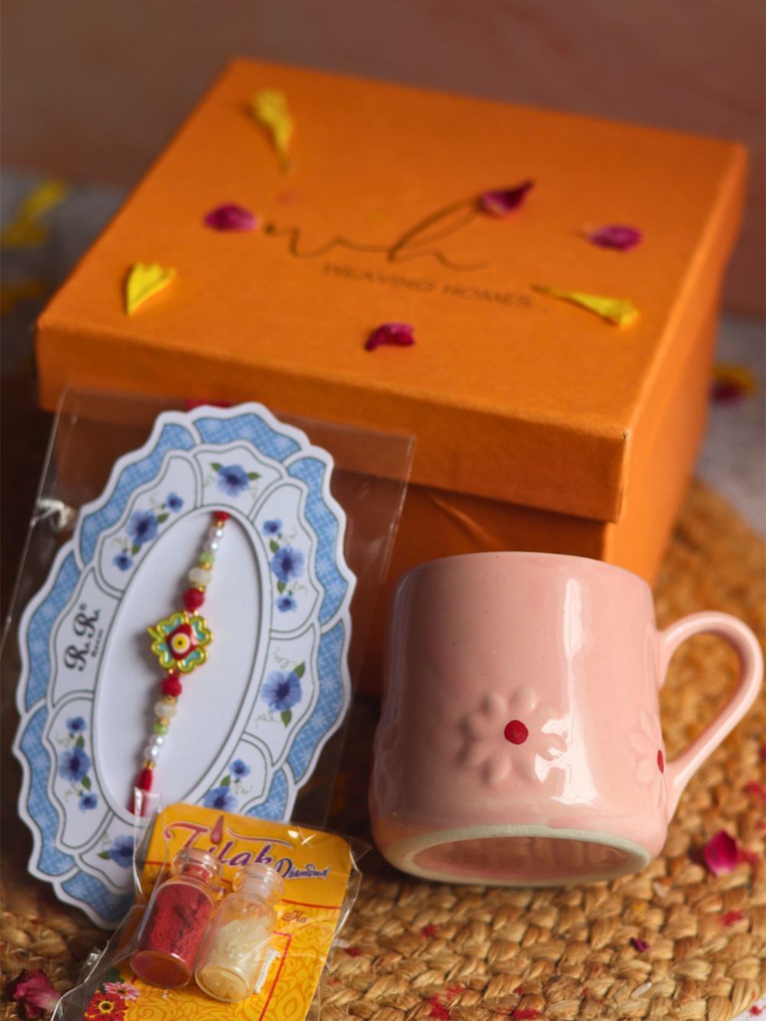 

WEAVING HOMES Set Of 1 Rakhi With Pink lily Mug