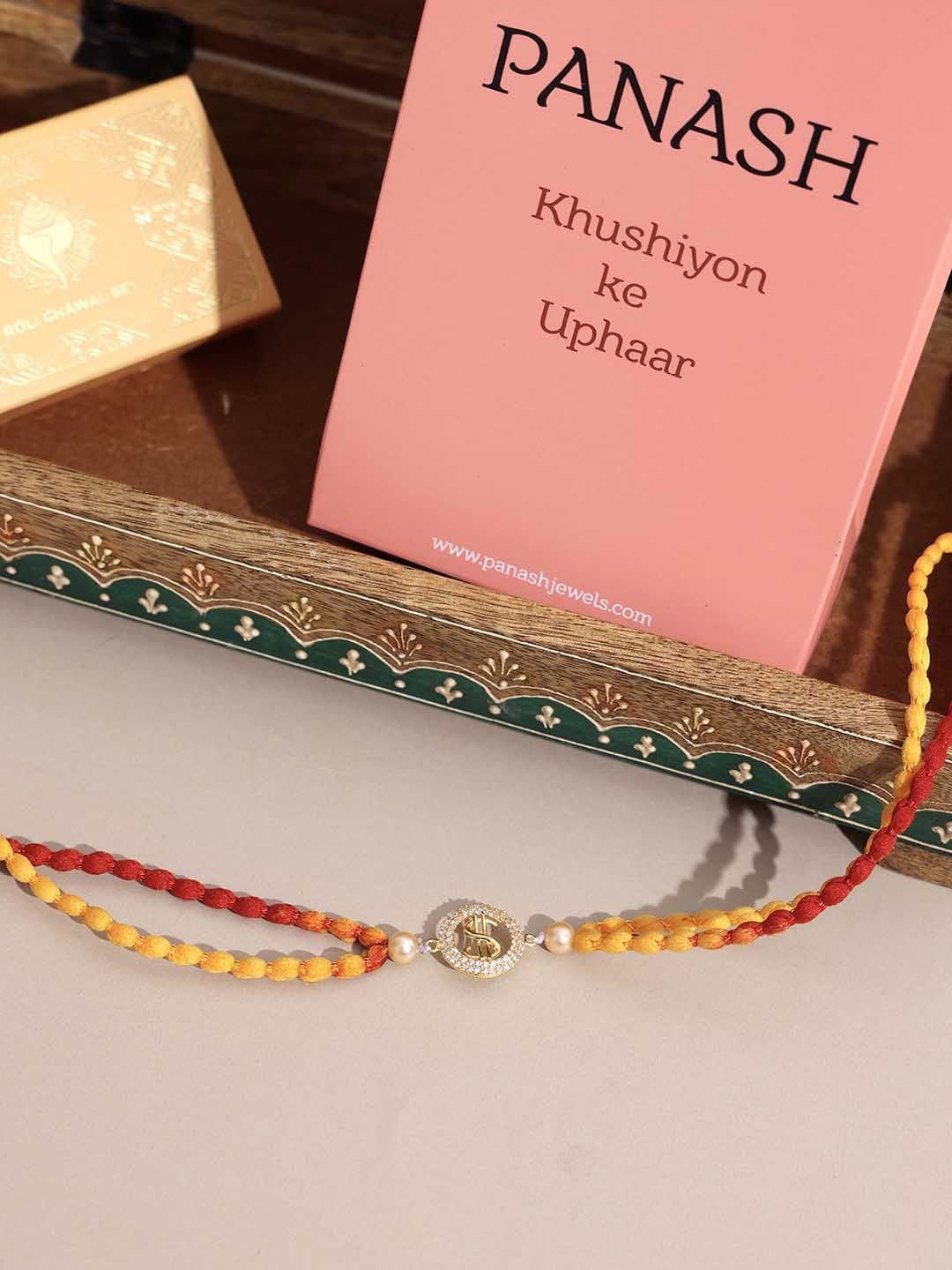 

PANASH- 925 Sterling Gold -Plated CZ Stone Studded Rakhi With Roli Chawal