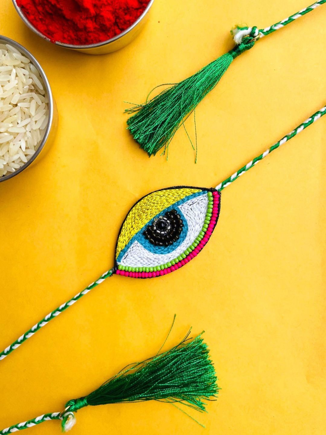 

Crunchy Fashion Beaded Evil Eye Thread Rakhi, Green