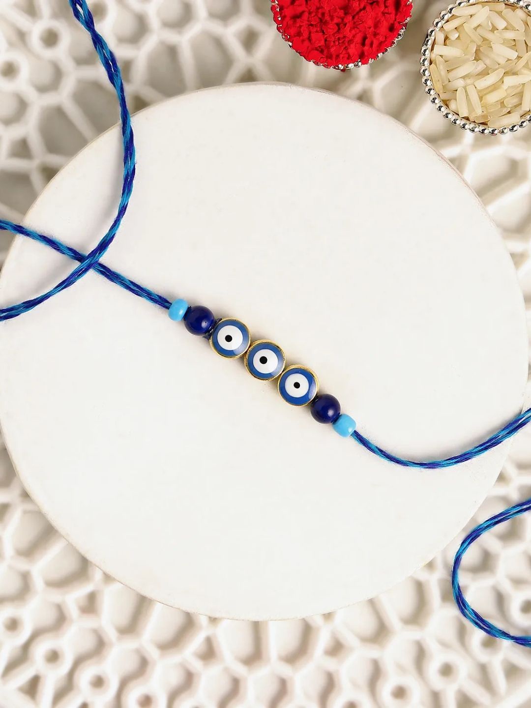 

fnp Rakhi With Cake & Roli Chawal Gift Set, Blue