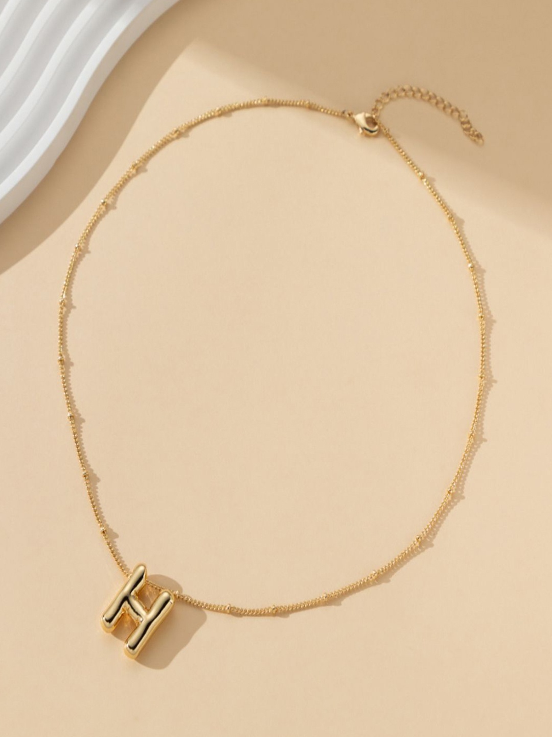 

AQUASTREET 18K Plated Waterproof Anti Tarnish Balloon H Necklace, Gold