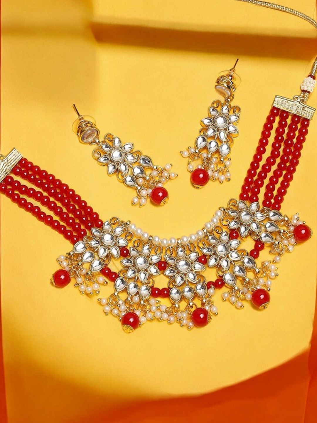 

Anouk Gold-Toned Kundan Studded Jewellery Set