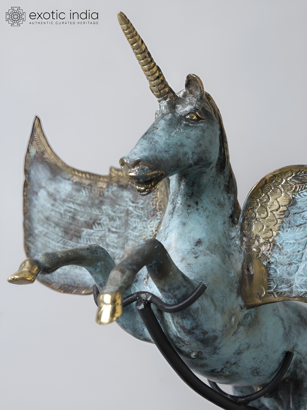 

Exotic India Blue & Gold Toned Unicorn Statue Brass Figurine Showpiece
