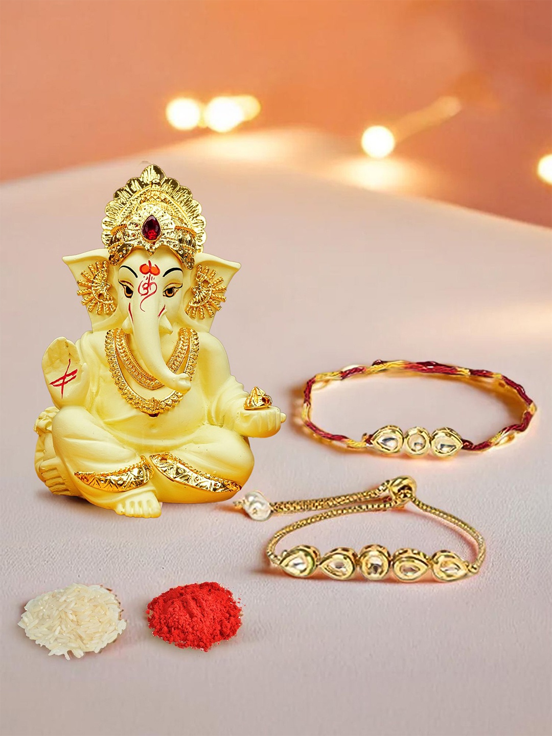 

Ekhasa Set Of 2 Bhaiya Bhabhi Rakhi With Ganesha Idol, Yellow