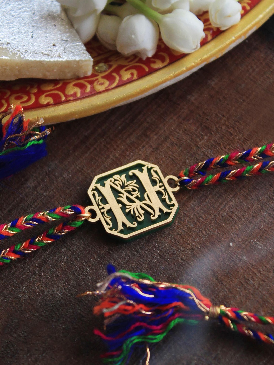 

BeAbhika C Initial Acrylic Thread Rakhi with Roli Chawal Capsules, Gold