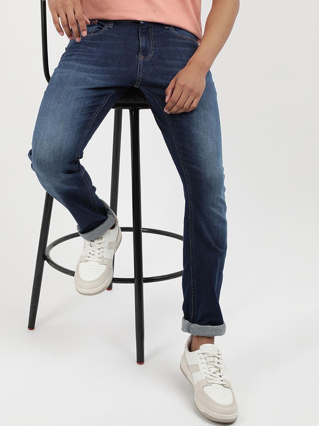 

Tommy Hilfiger Men Slim Fit Mid-Rise Light Fade Stretchable Jeans, Blue