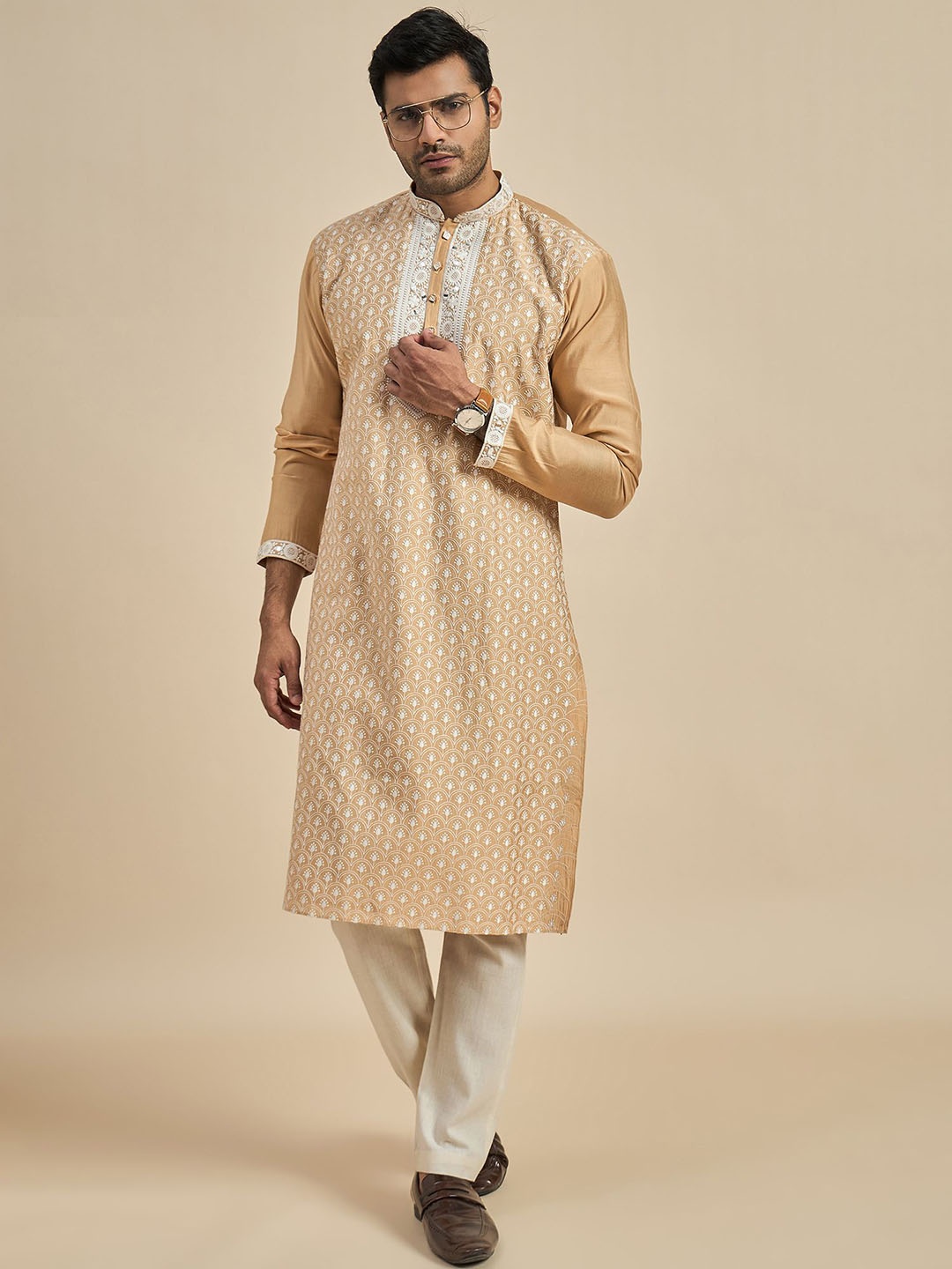 

Anouk Ethnic Motifs Embroidered Mandarin Collar Thread Work Straight Kurta, Tan