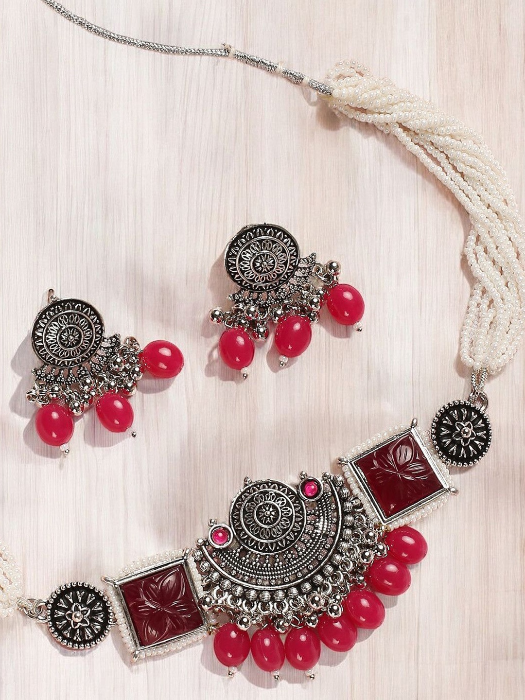 

Sangria Silver-Toned Stone-Studded & Beaded Oxidised Engraved Jaipur Jewellery Set