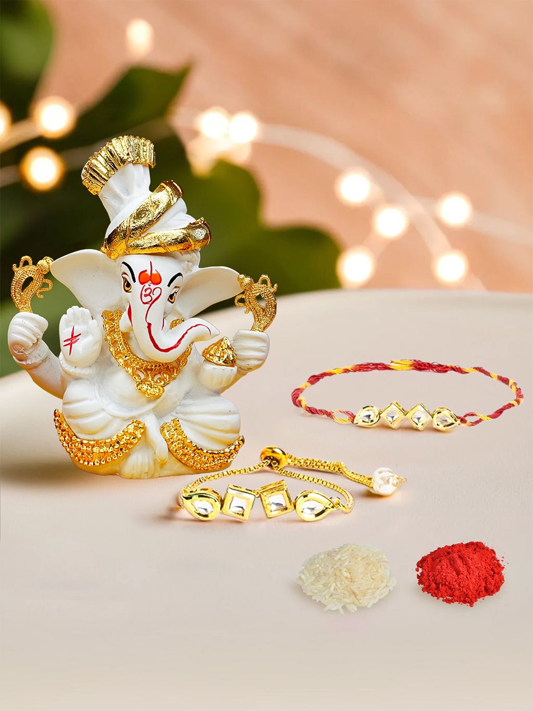 

Ekhasa Set Of 3 Bhaiya Bhabhi Rakhi With Ganesha Idol & Roli Chawal, Gold