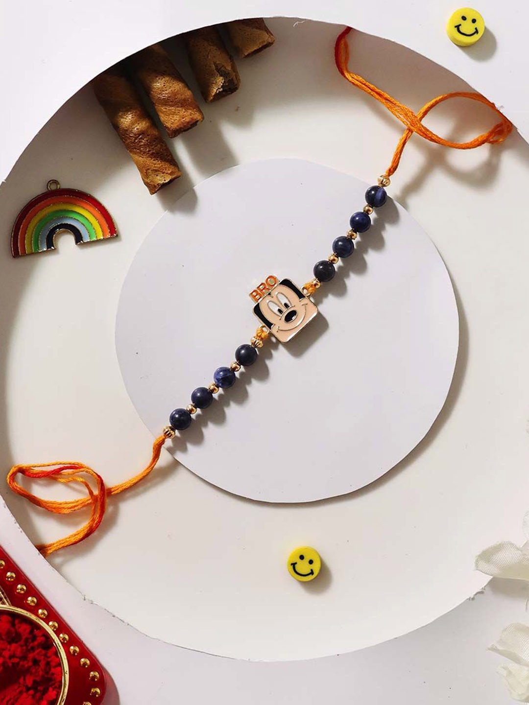 

Shubhanjali Micky Mouse Sodalite Thread Rakhi With Roli Chawal & Greeting Card, Blue