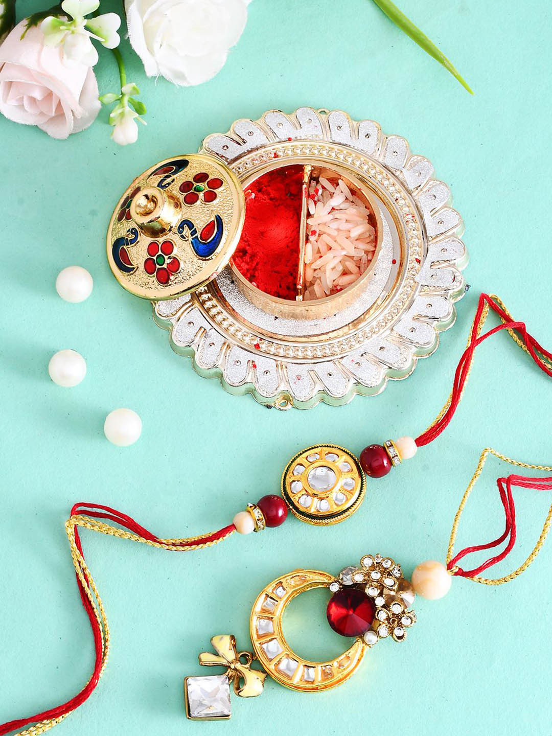 

Aapno Rajasthan Set of 2 Beaded Bhaiya Bhabhi Rakhi With Pooja Thai And Roli Chawal, Red