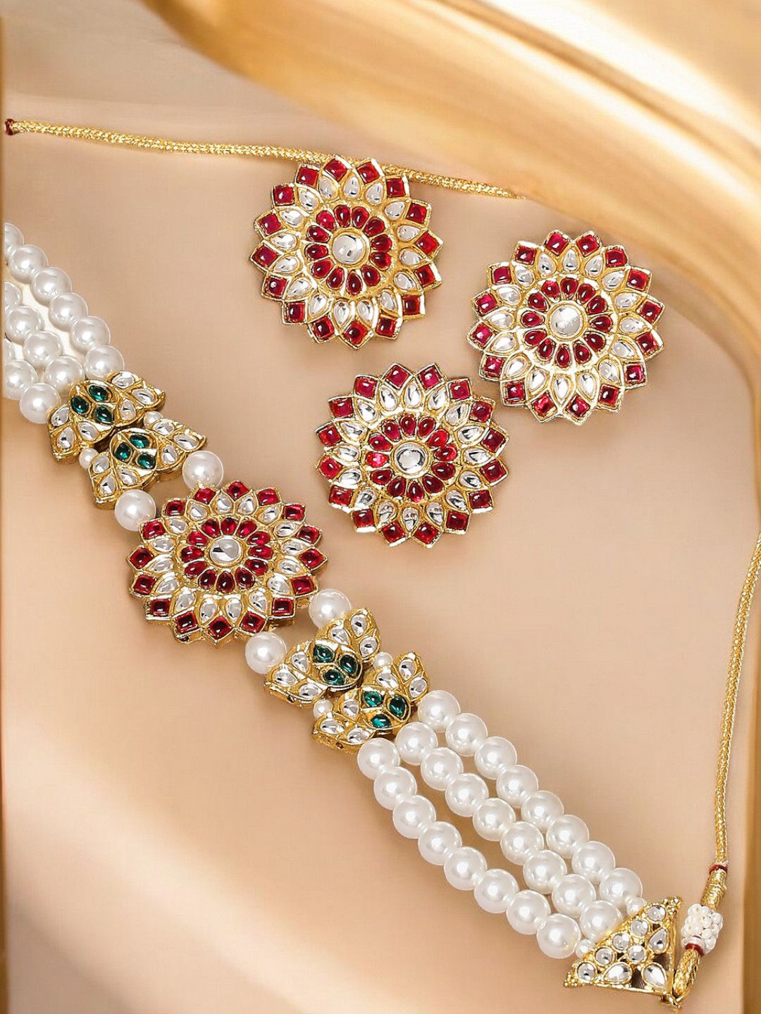 

Anouk Gold-Toned Lotus Design Kundan Stone Studded & Beaded Jewellery Set