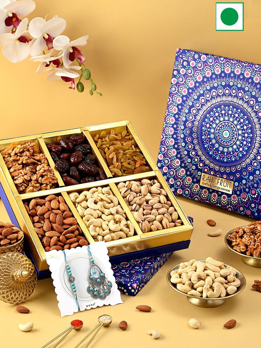 

RawFruit Bhaiya Bhabhi Rakhi with Roli Chawal DryFruits Gift Set, Blue