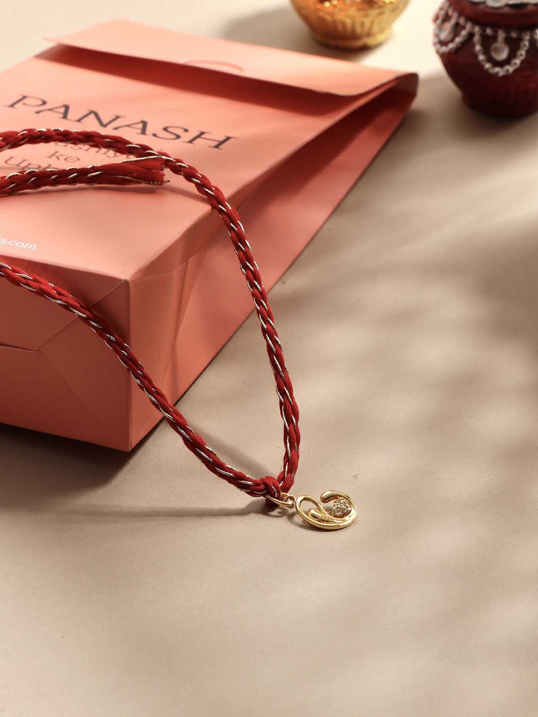 

PANASH- 925 Sterling Gold -Plated CZ Stone Studded Rakhi With Roli Chawal