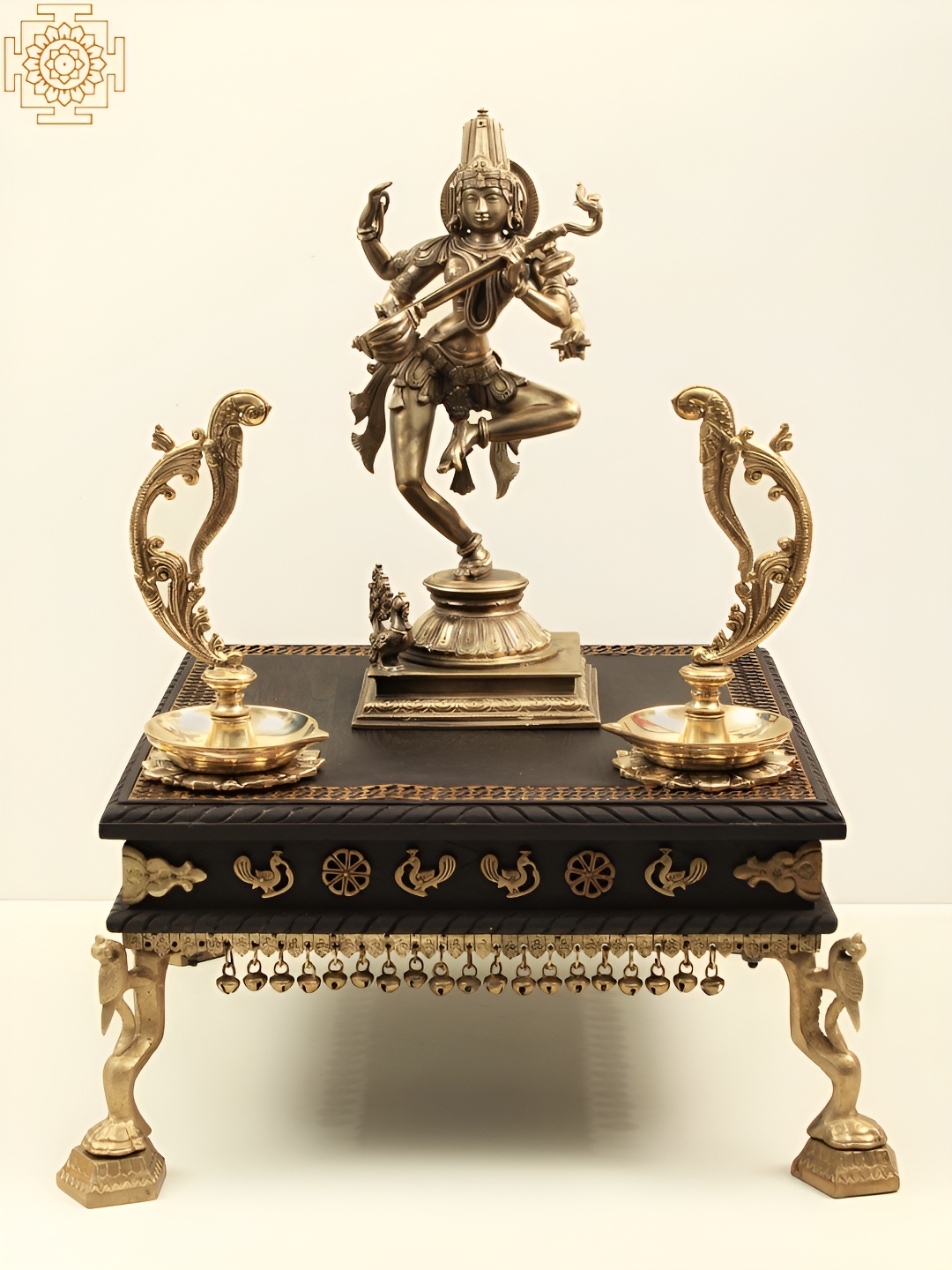 

Exotic India Gold-Toned & Black Wooden pedestal with Brass Ghungroos Showpiece