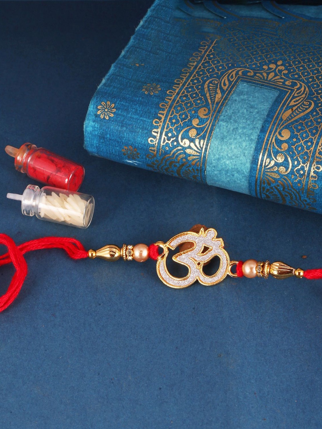 

Vighnaharta Set of 2 Gold and Rhodium Plated Om and Khanda Thread Rakhis