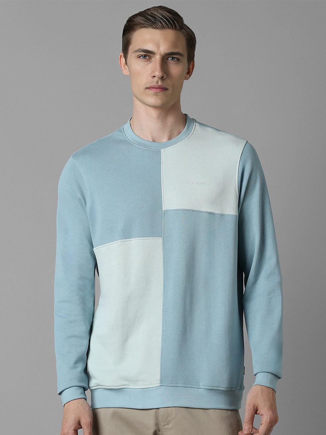 

Louis Philippe Jeans Men Colourblocked Cotton Knitted Sweatshirt, Blue